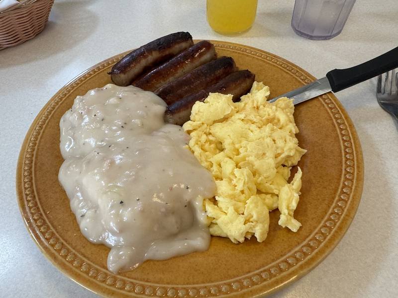 Biscuits and Sausage Gravy — American breakfast recipe, served and ready to eat