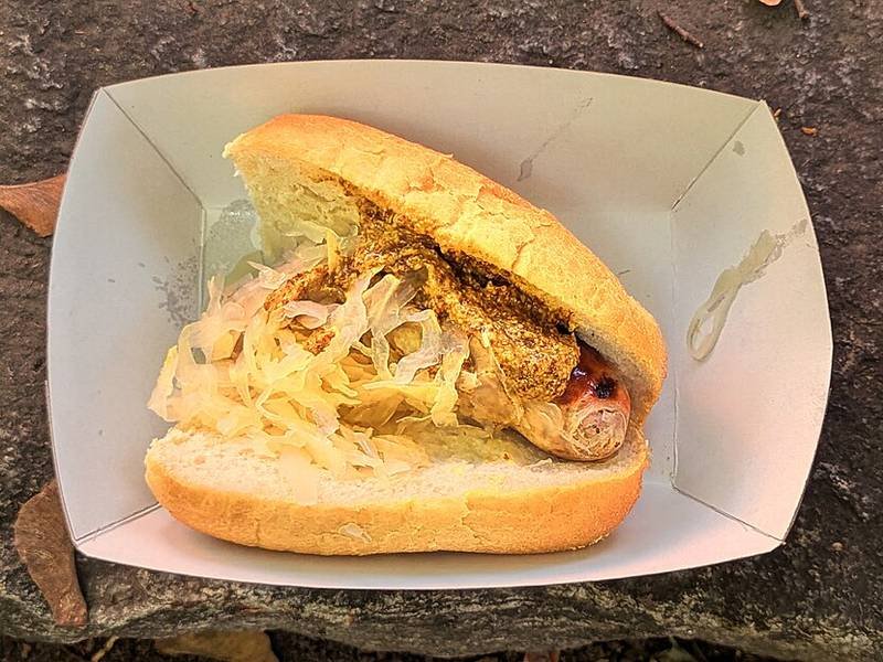 Bratwurst with Sauerkraut — German dinner recipe, served and ready to eat