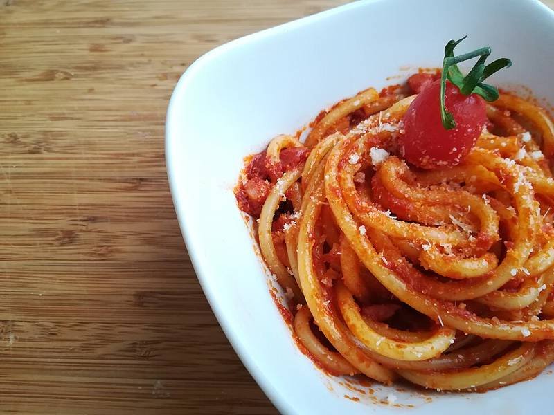 Bucatini all'Amatriciana — Italian dinner recipe, served and ready to eat