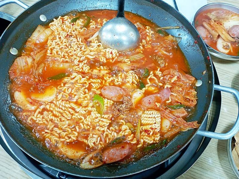 Budae Jjigae — Korean dinner recipe, served and ready to eat
