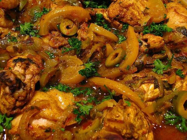 Ingredients and preparation for chicken tagine with olives