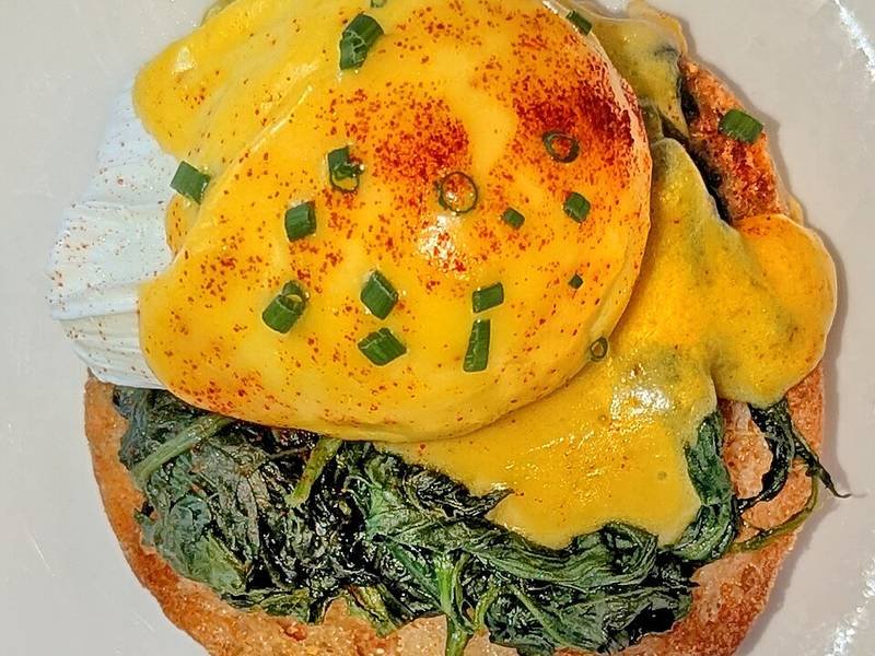Eggs Florentine — French breakfast recipe, served and ready to eat