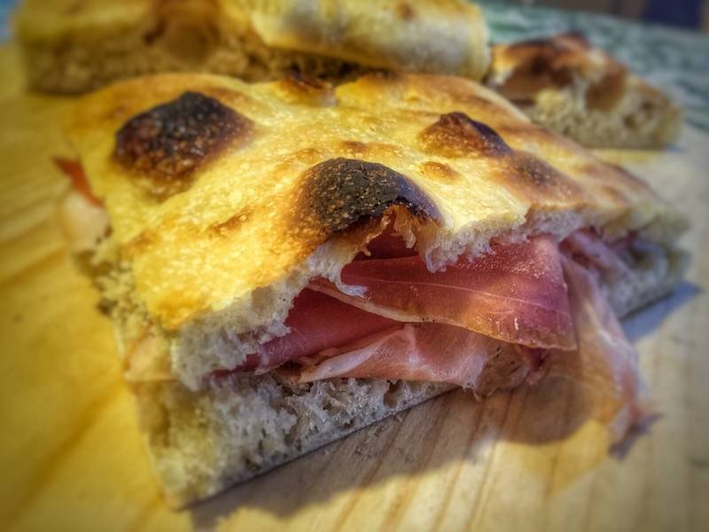 Focaccia Genovese — Italian baking recipe, served and ready to eat