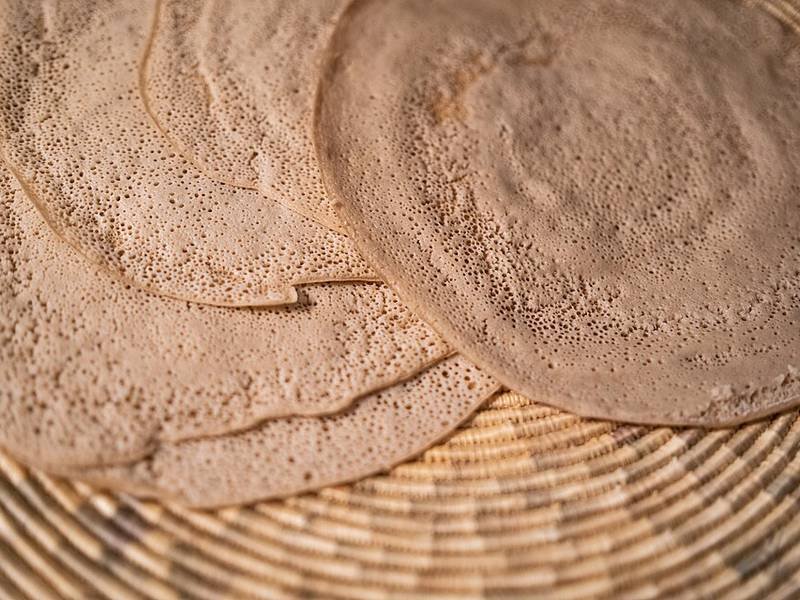 Injera — Ethiopian baking recipe, served and ready to eat