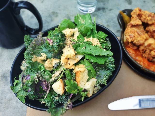Ingredients and preparation for kale caesar salad