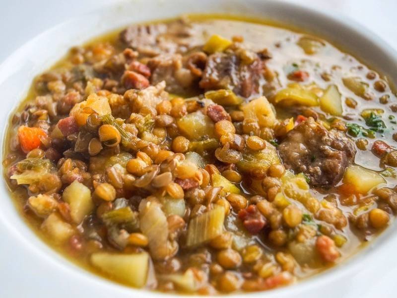 Spiced Red Lentil Soup — International healthy recipe, served and ready to eat