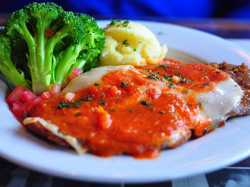 Milanesa Napolitana — Argentinian dinner recipe, served and ready to eat