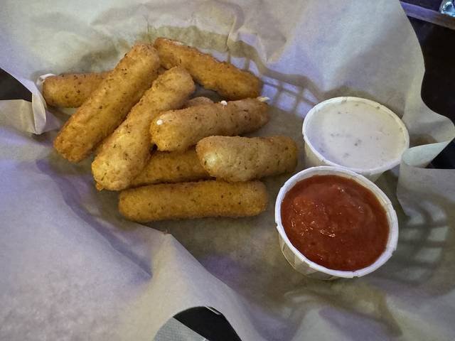 Ingredients and preparation for mozzarella sticks