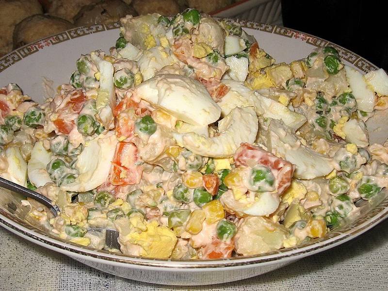 Olivier Salad — Russian holiday specials recipe, served and ready to eat