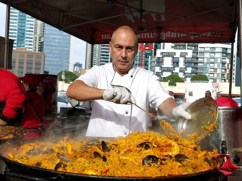 Paella Valenciana — Spanish dinner recipe, served and ready to eat