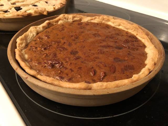 Ingredients and preparation for pecan pie