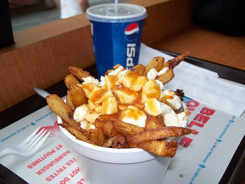 Poutine, a Canadian lunch recipe — cheese curds and chips with gravy