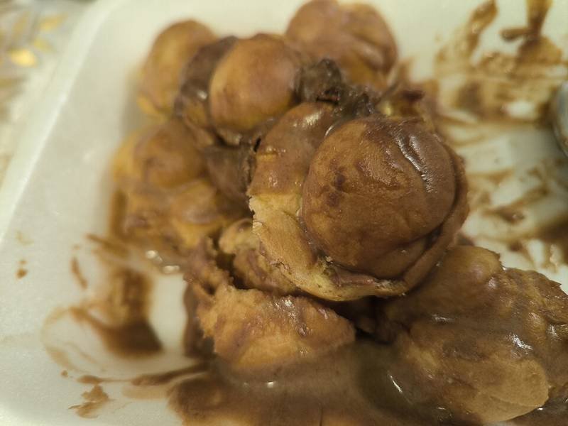Profiteroles — French desserts recipe, served and ready to eat