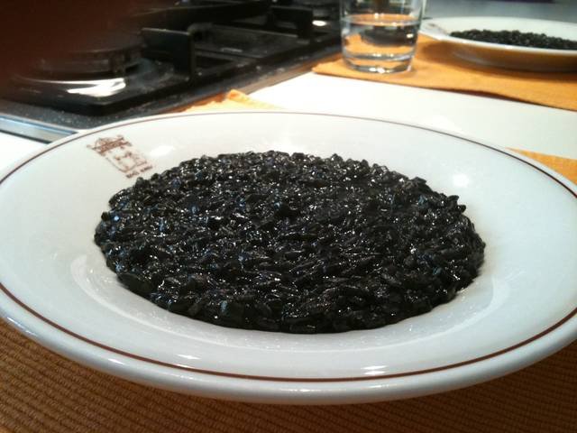 Ingredients and preparation for risotto al nero di seppia