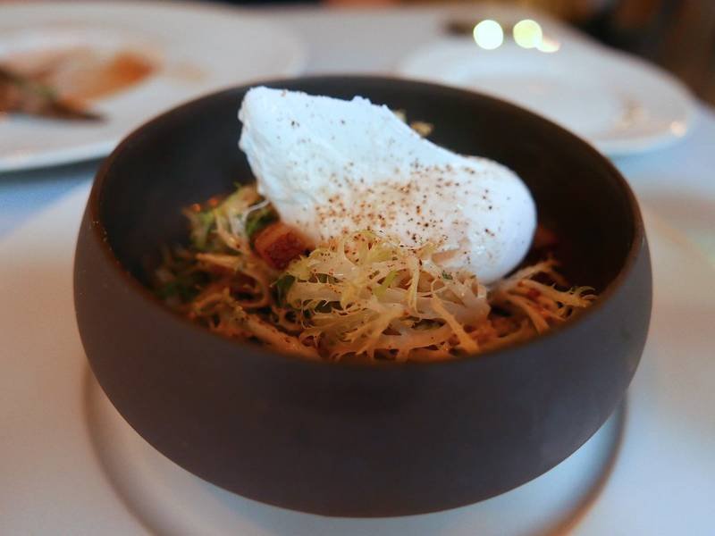 Frisée aux Lardons — French lunch recipe, served and ready to eat