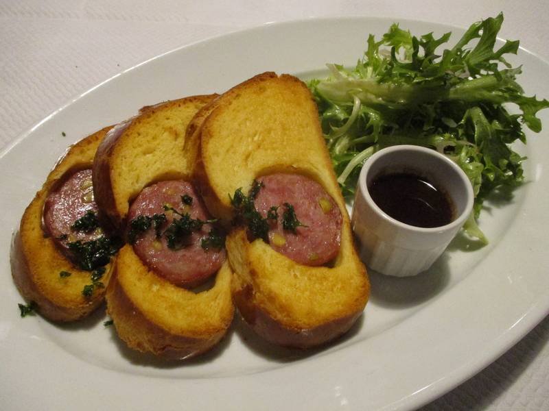 Saucisson en Brioche — French appetizers recipe, served and ready to eat
