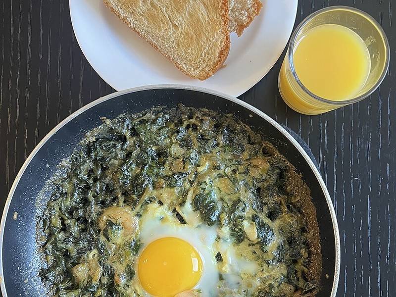 Green Shakshuka — Israeli breakfast recipe, served and ready to eat