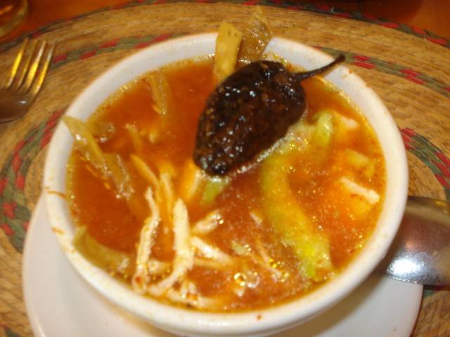 Ingredients and preparation for sopa de tortilla