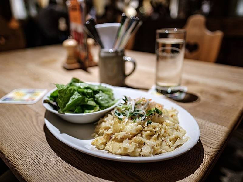 Käsespätzle — German dinner recipe, served and ready to eat